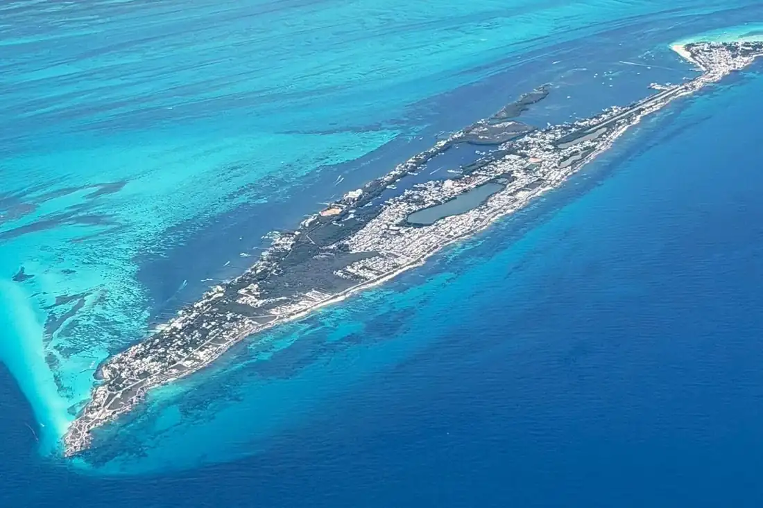 Aerial view of Isla Mujeres surrounded by turquoise water